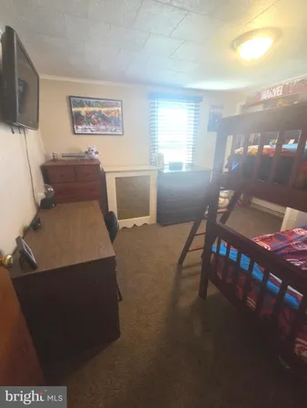 a spacious bathroom with a bathtub and window