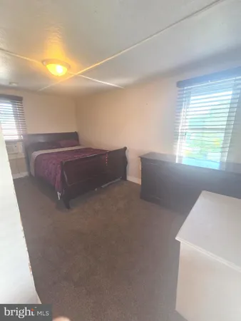 a view of a lake with a building in the background