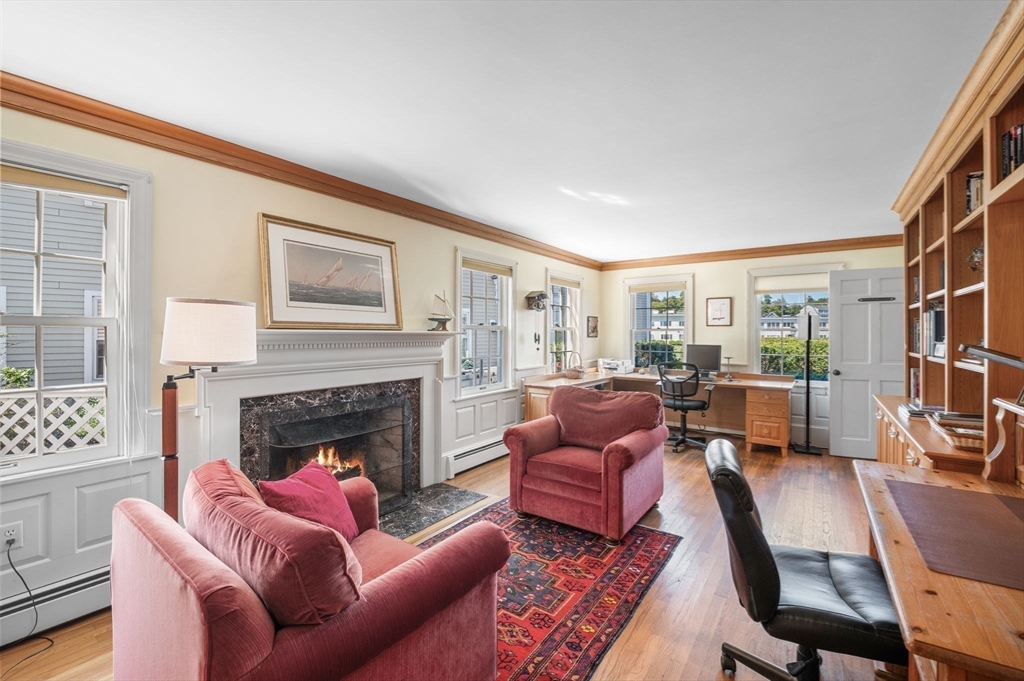 19 Doaks Lane Marblehead, MA 01945 - Photo 14 of 39 a living room with furniture fireplace and a large window