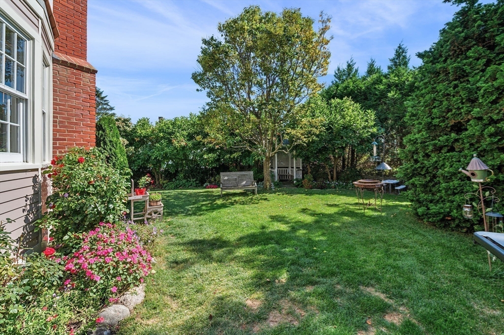 19 Doaks Lane Marblehead, MA 01945 - Photo 26 of 39 a view of a house with a yard and garden