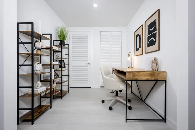 a view of workspace with wooden floor