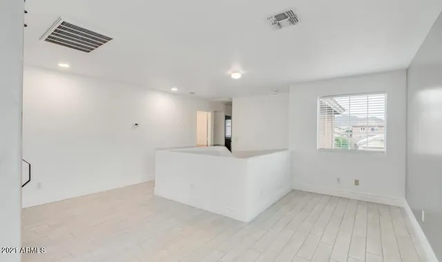 a view of kitchen and windows