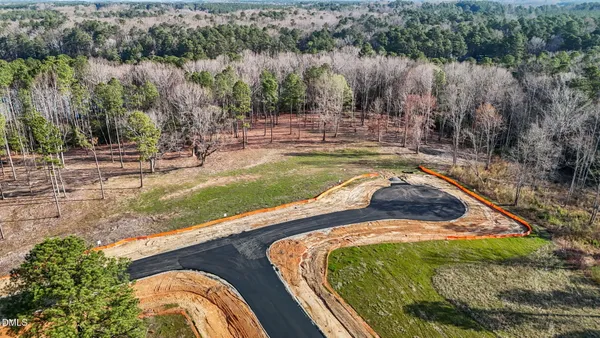 a view of a lake with a big yard