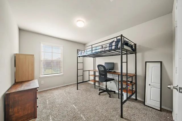 a livingroom with furniture and a window