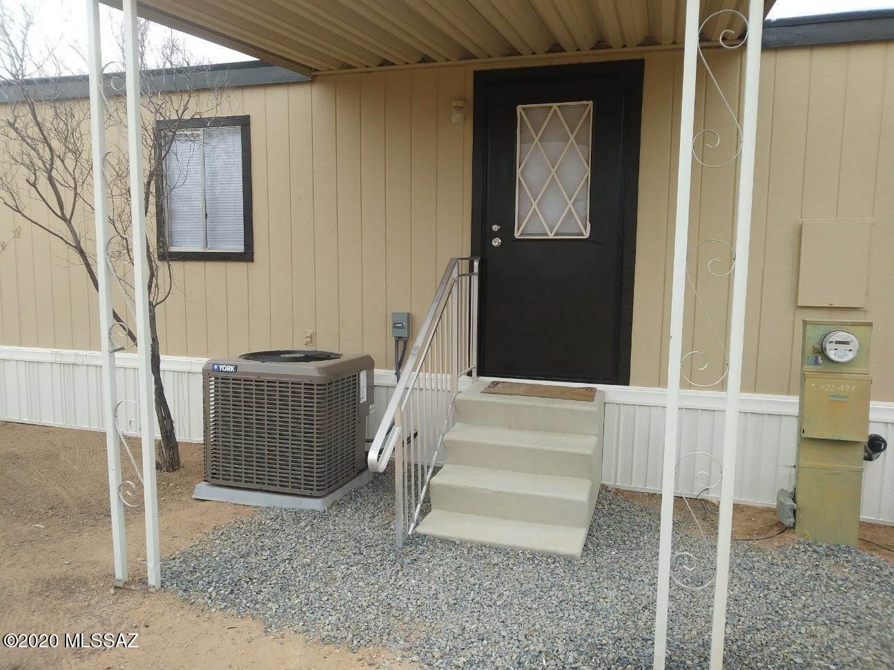 12940 North Derringer Road Marana, AZ 85653 - Photo 16 of 17 derringer rear view_new AC