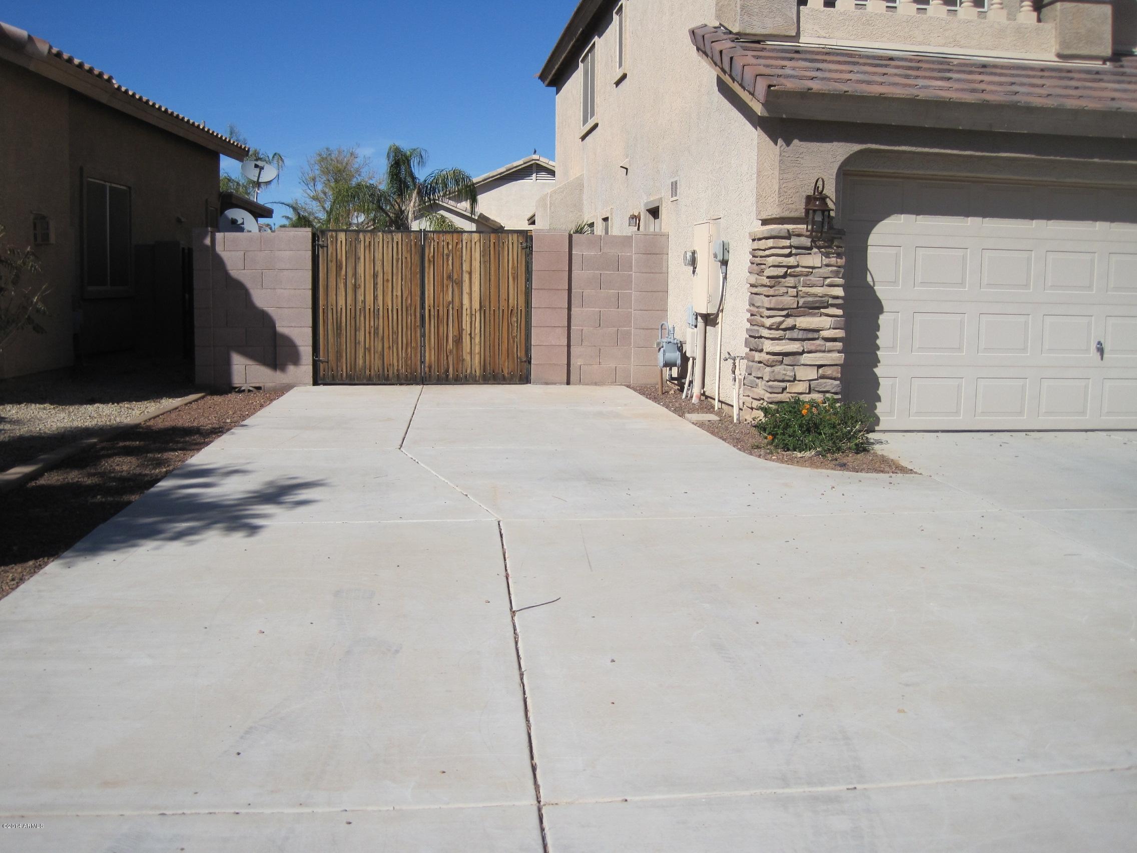 15732 West Redfield Road Surprise, AZ 85379 - Photo 4 of 33 RV GATE AND SLAB