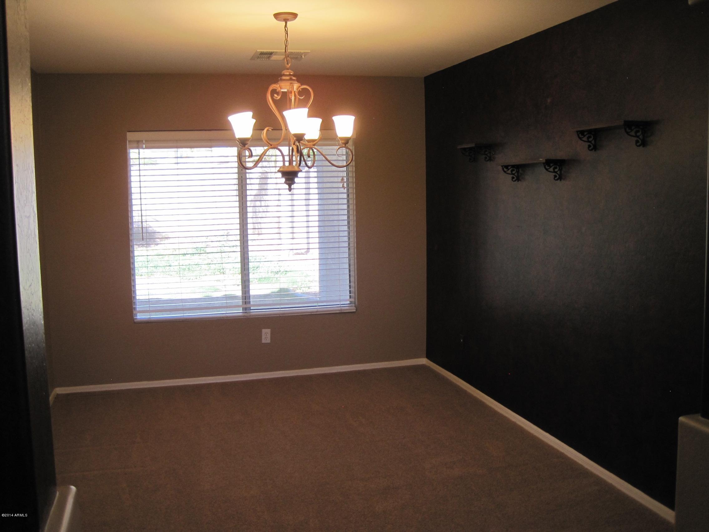 15732 West Redfield Road Surprise, AZ 85379 - Photo 8 of 33 FORMAL DINING ROOM