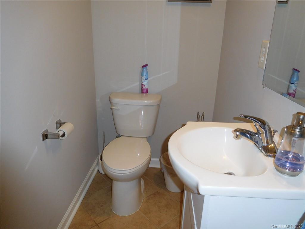161 Cook Sears Road Gastonia, NC 28056 - Photo 22 of 31 a bathroom with a sink and a toilet