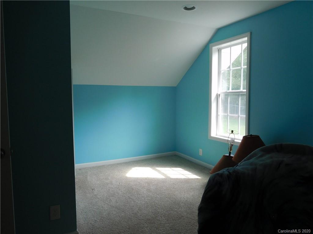 161 Cook Sears Road Gastonia, NC 28056 - Photo 24 of 31 a bedroom with a bed and a window