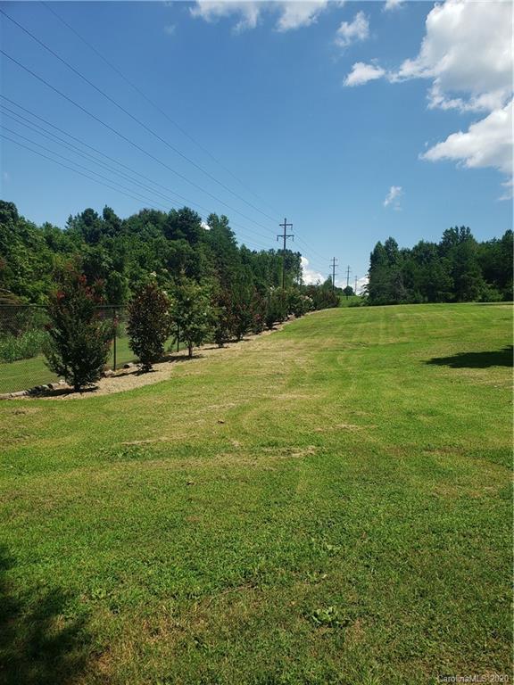 161 Cook Sears Road Gastonia, NC 28056 - Photo 29 of 31 a view of field with tall trees