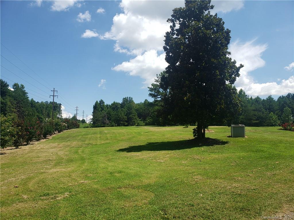 161 Cook Sears Road Gastonia, NC 28056 - Photo 30 of 31 a view of field with trees in the background