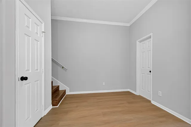 a view of a kitchen with a sink and a kitchen view
