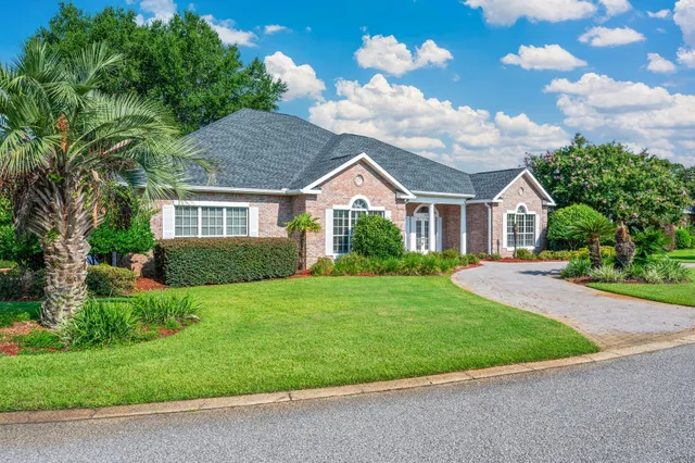 a view of a yard in front of house
