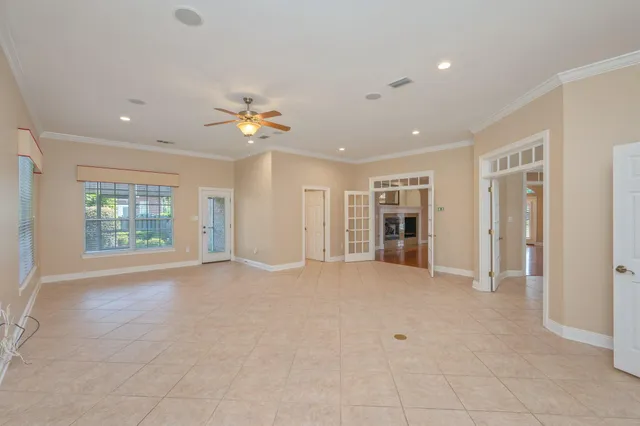 a view of an empty room with a window