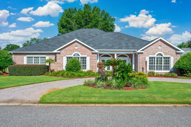 a house view with a garden space