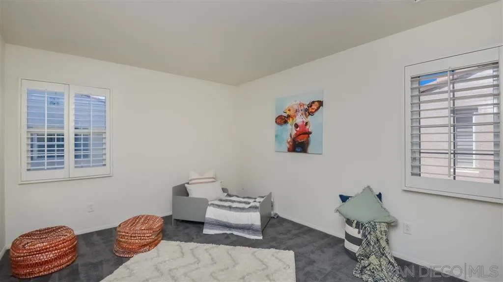 12 Night Bloom Irvine, CA 92602 - Photo 16 of 25 a living room with furniture and a window