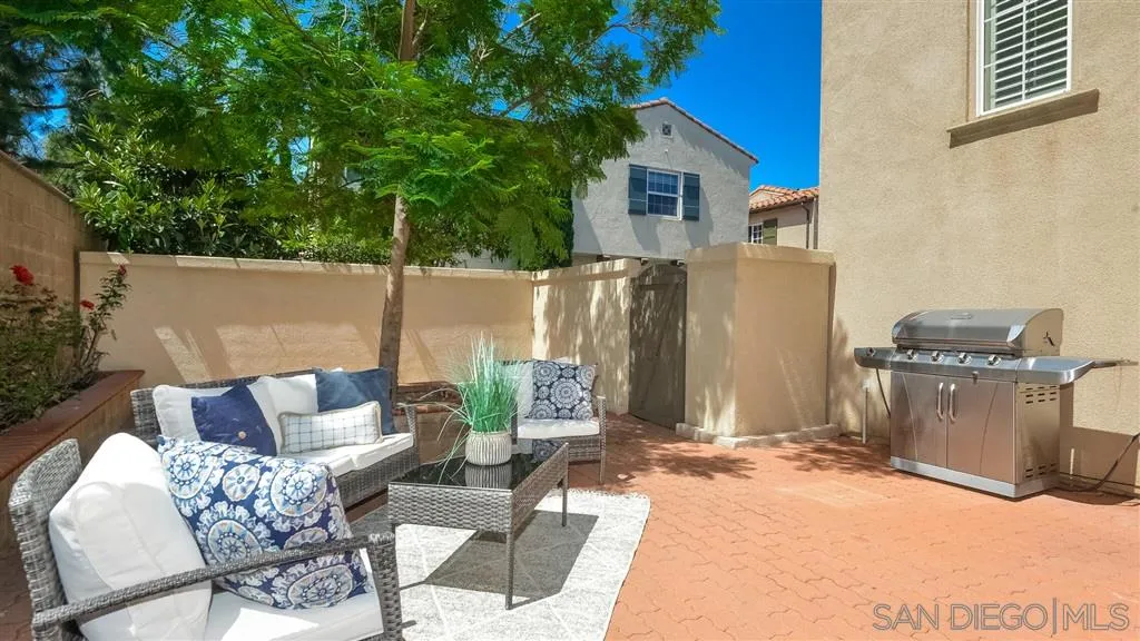 12 Night Bloom Irvine, CA 92602 - Photo 19 of 25 a view of backyard of house with seating space