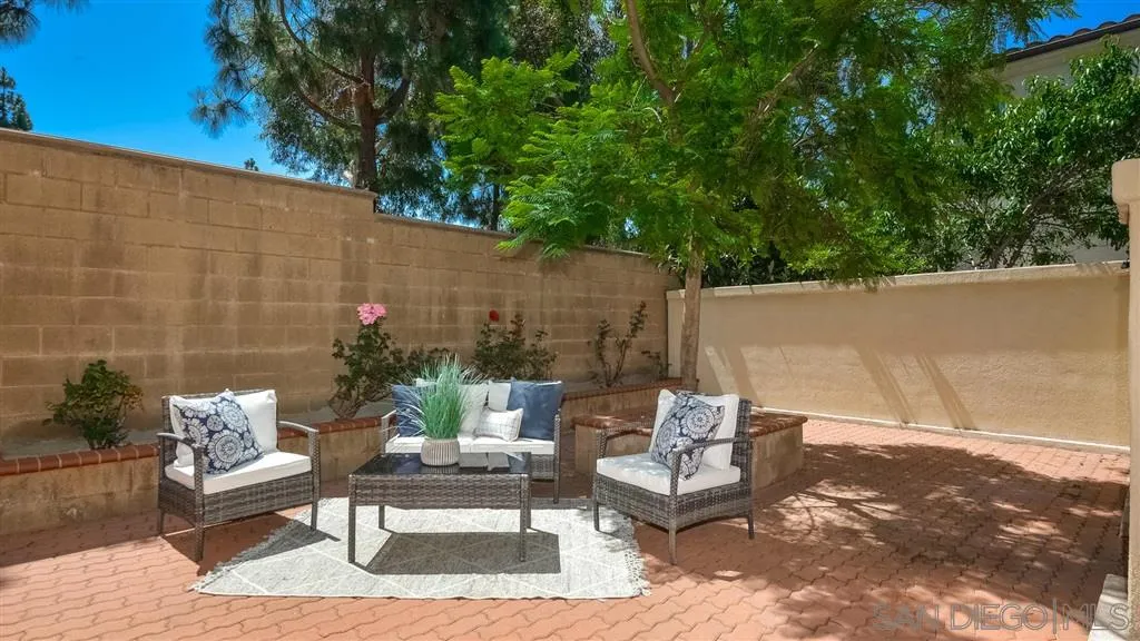 12 Night Bloom Irvine, CA 92602 - Photo 20 of 25 a outdoor living space with furniture and a potted plant