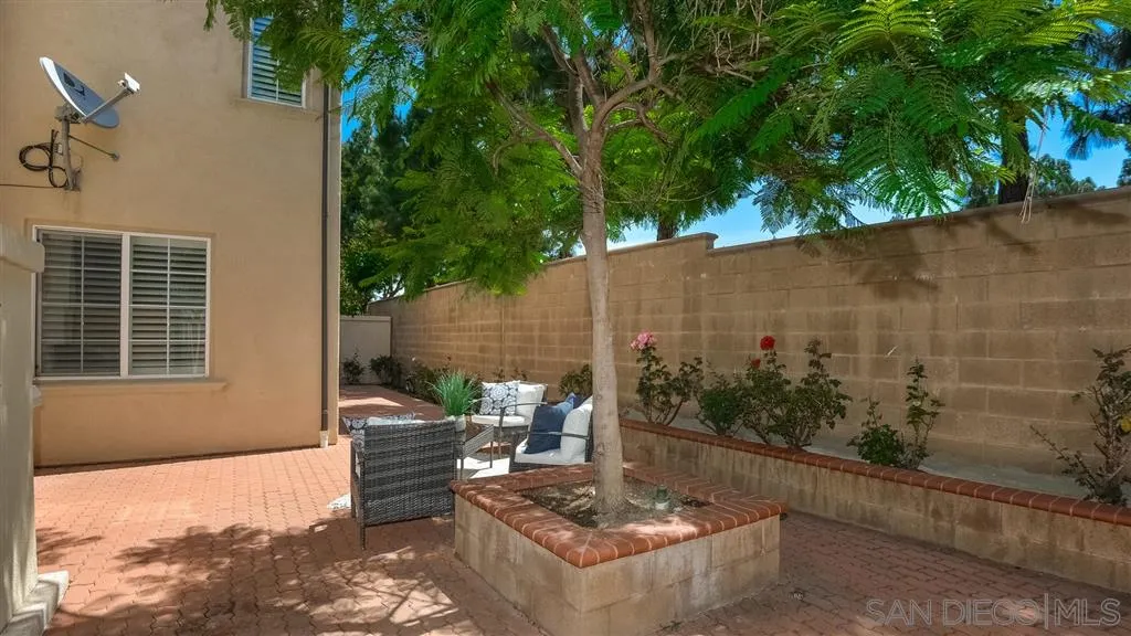 12 Night Bloom Irvine, CA 92602 - Photo 21 of 25 a view of a backyard with plants and a patio