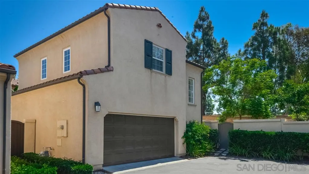 12 Night Bloom Irvine, CA 92602 - Photo 23 of 25 a front view of a house with garden