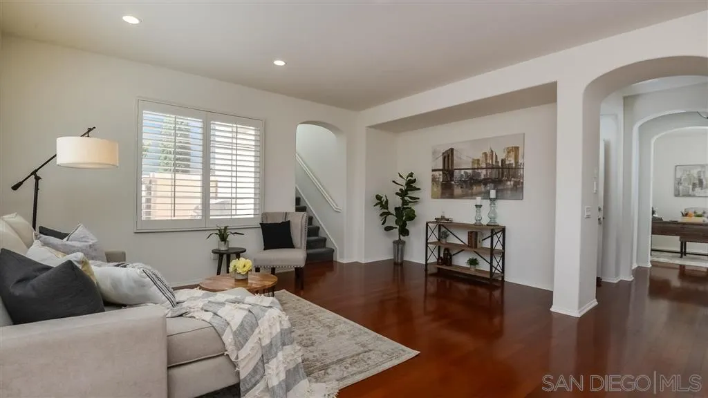 12 Night Bloom Irvine, CA 92602 - Photo 4 of 25 a living room with furniture window and wooden floor