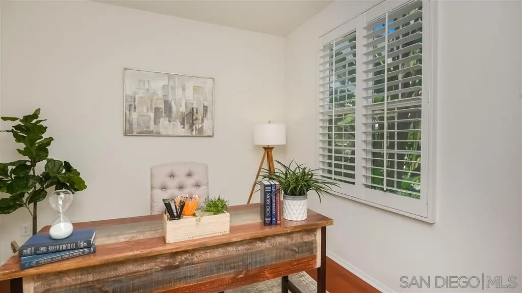 12 Night Bloom Irvine, CA 92602 - Photo 8 of 25 a living room with furniture and a potted plant