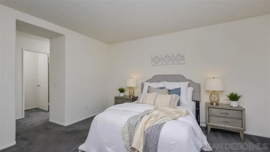 12 Night Bloom Irvine, CA 92602 - Photo 10 of 25 a bedroom with a bed and a dresser