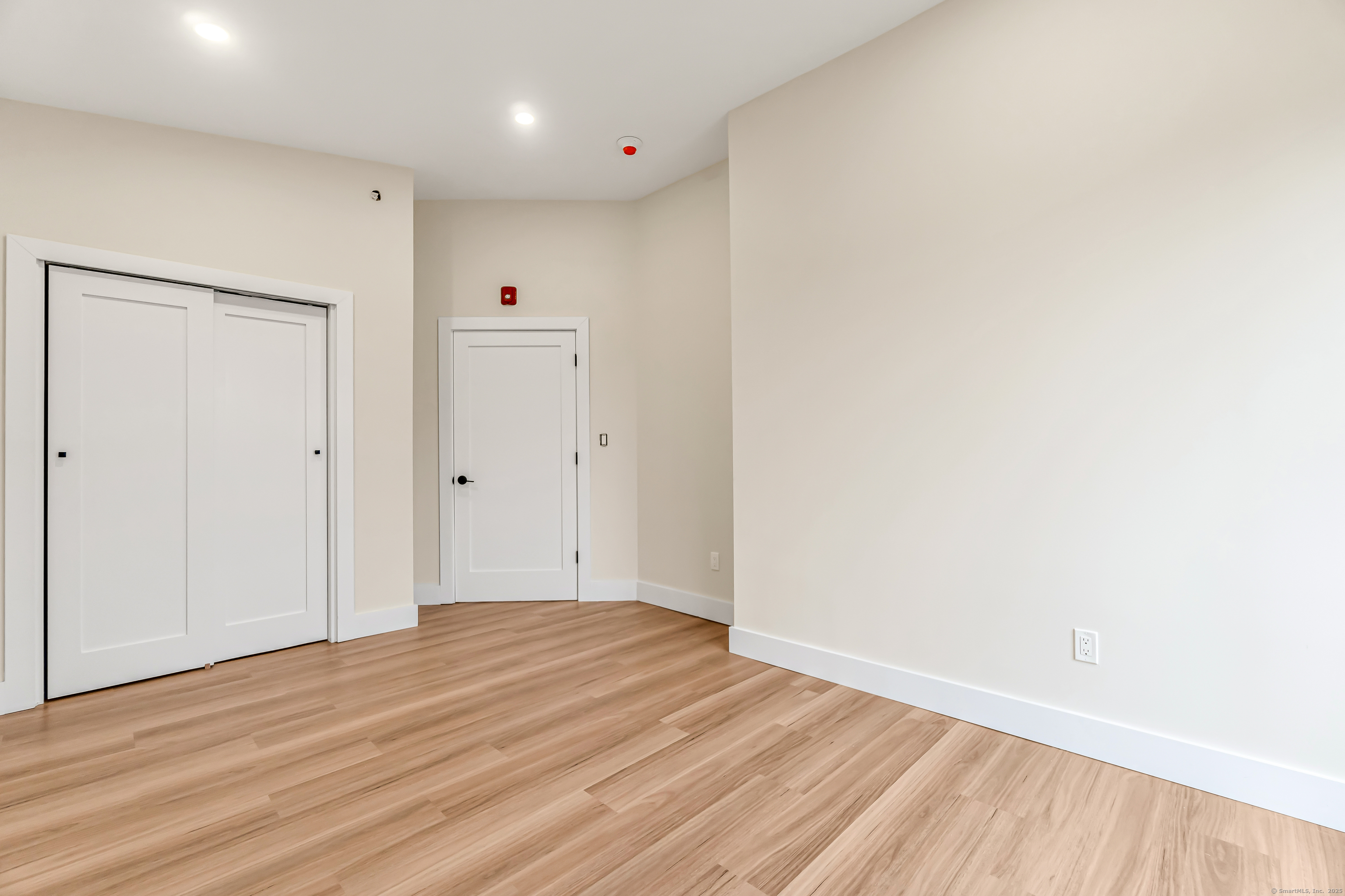 937 Post Road, Unit 3A Fairfield, CT 06824 - Photo 11 of 24 a view of an empty room