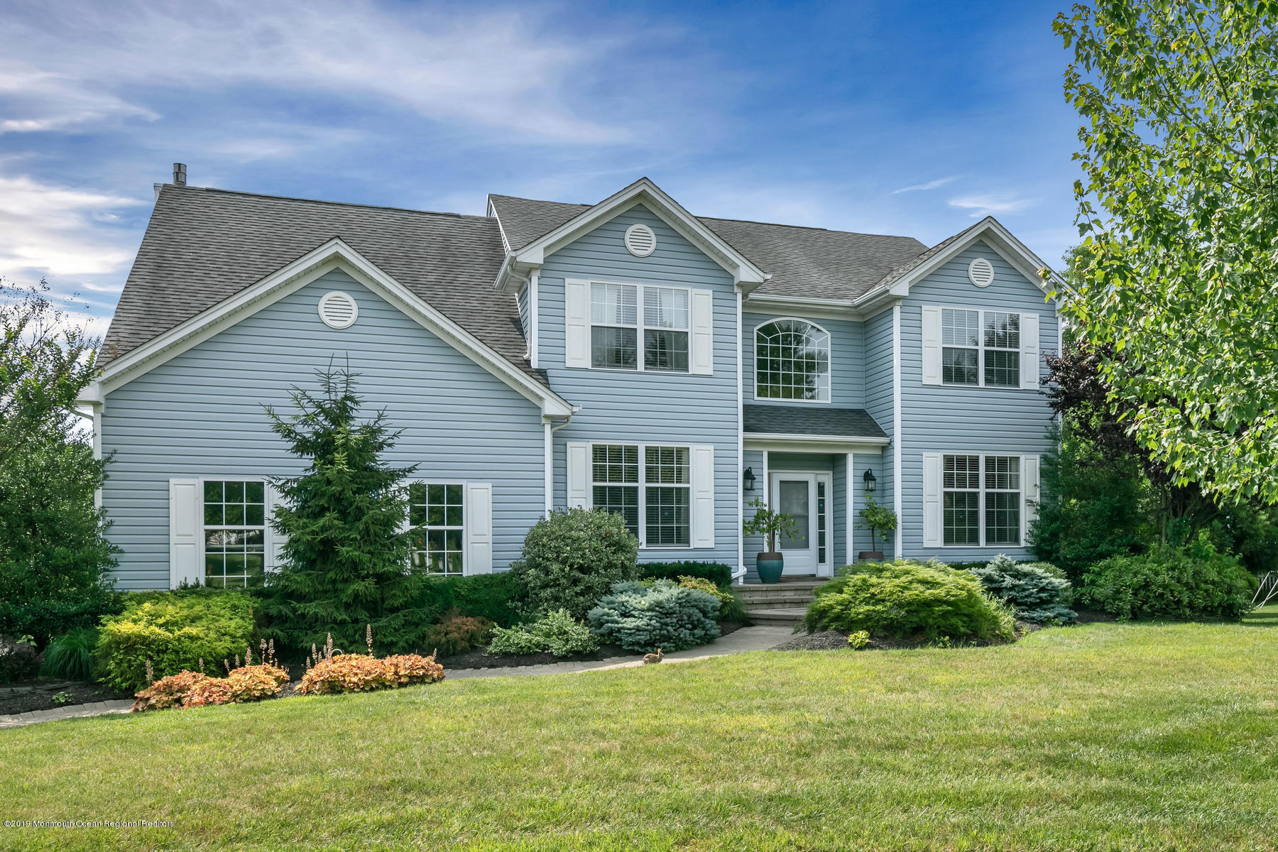 1614 Barkalow Road Wall, NJ 07719 - Photo 1 of 41 a front view of a house with a yard