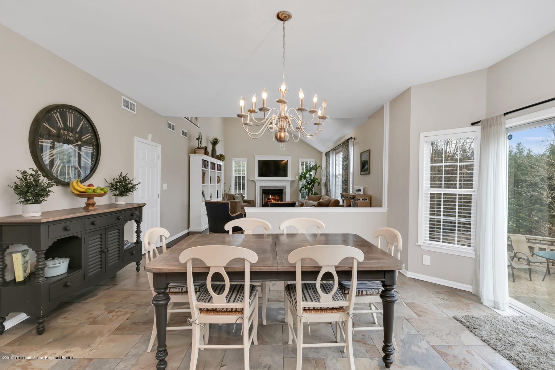 1614 Barkalow Road Wall, NJ 07719 - Photo 13 of 41 a view of a dining room with furniture and chandelier