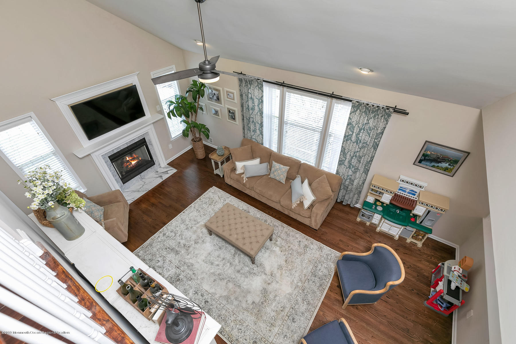 1614 Barkalow Road Wall, NJ 07719 - Photo 14 of 41 a living room with furniture and a flat screen tv