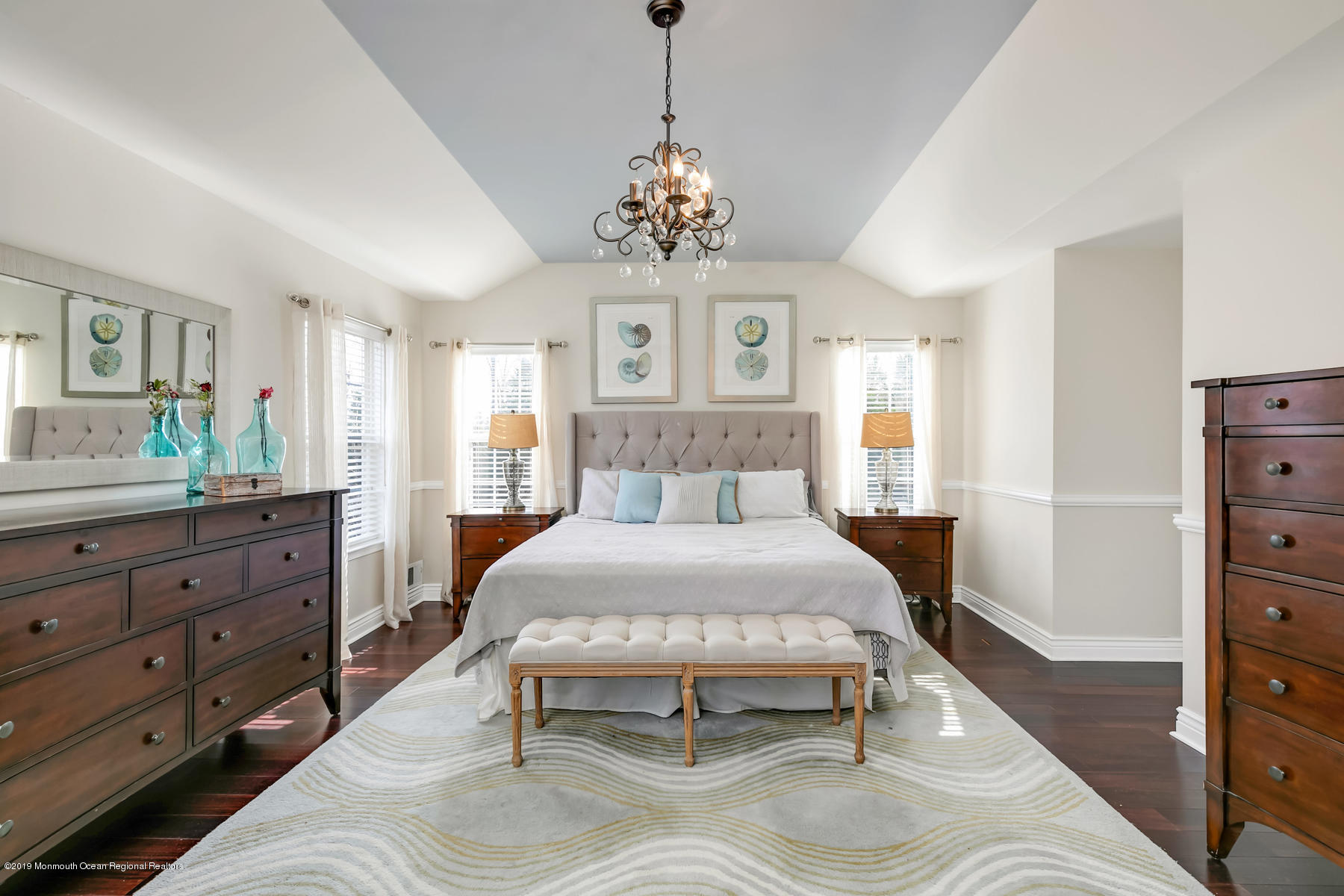 1614 Barkalow Road Wall, NJ 07719 - Photo 15 of 41 a spacious bedroom with a bed and wooden floor