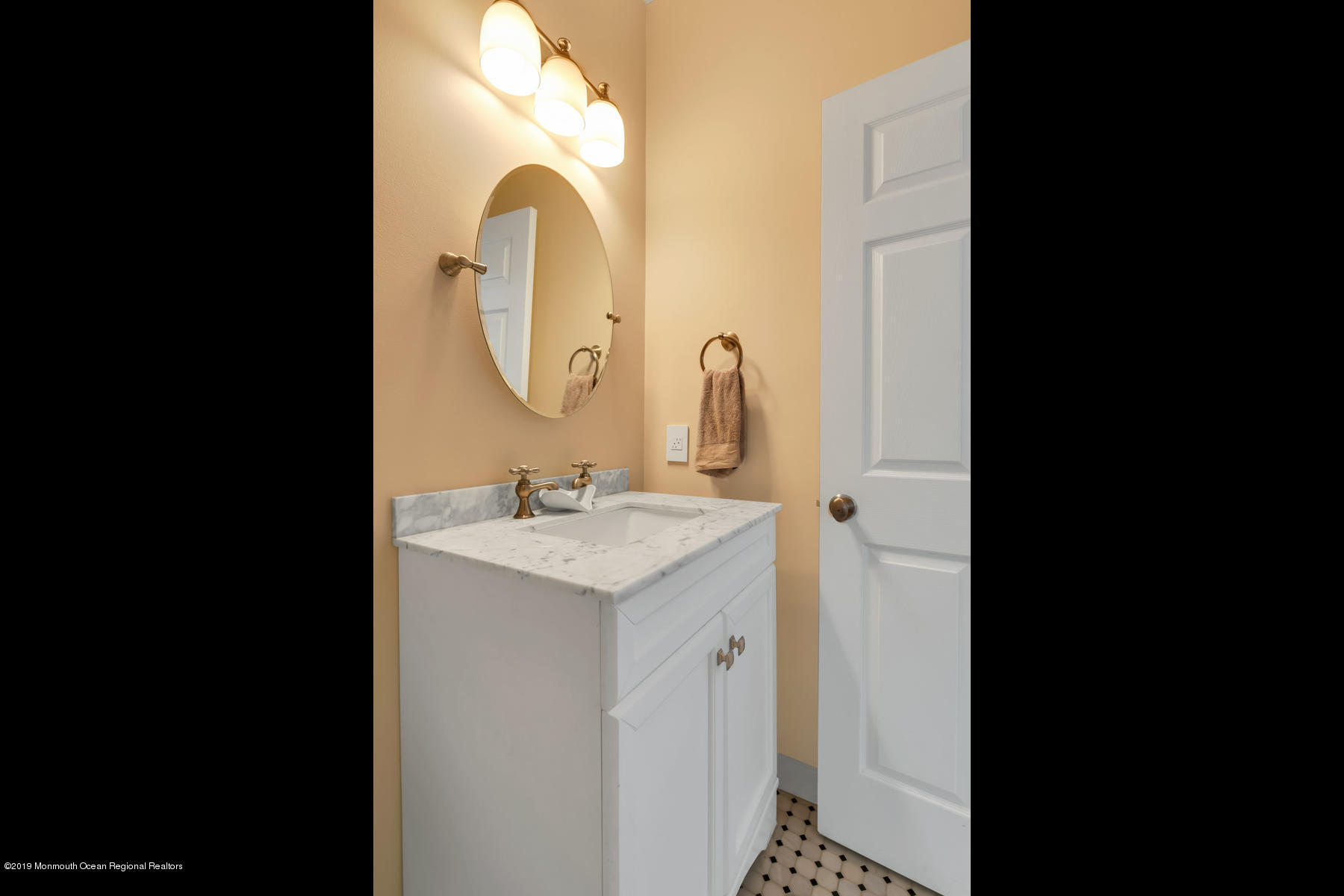 1614 Barkalow Road Wall, NJ 07719 - Photo 23 of 41 a bathroom with a sink and a mirror