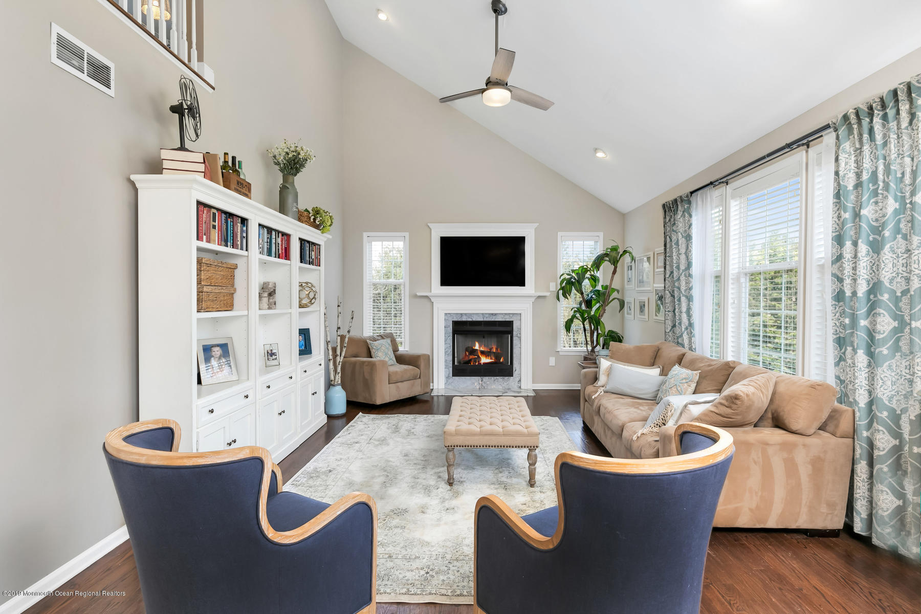 1614 Barkalow Road Wall, NJ 07719 - Photo 3 of 41 a living room with furniture a fireplace and a large window