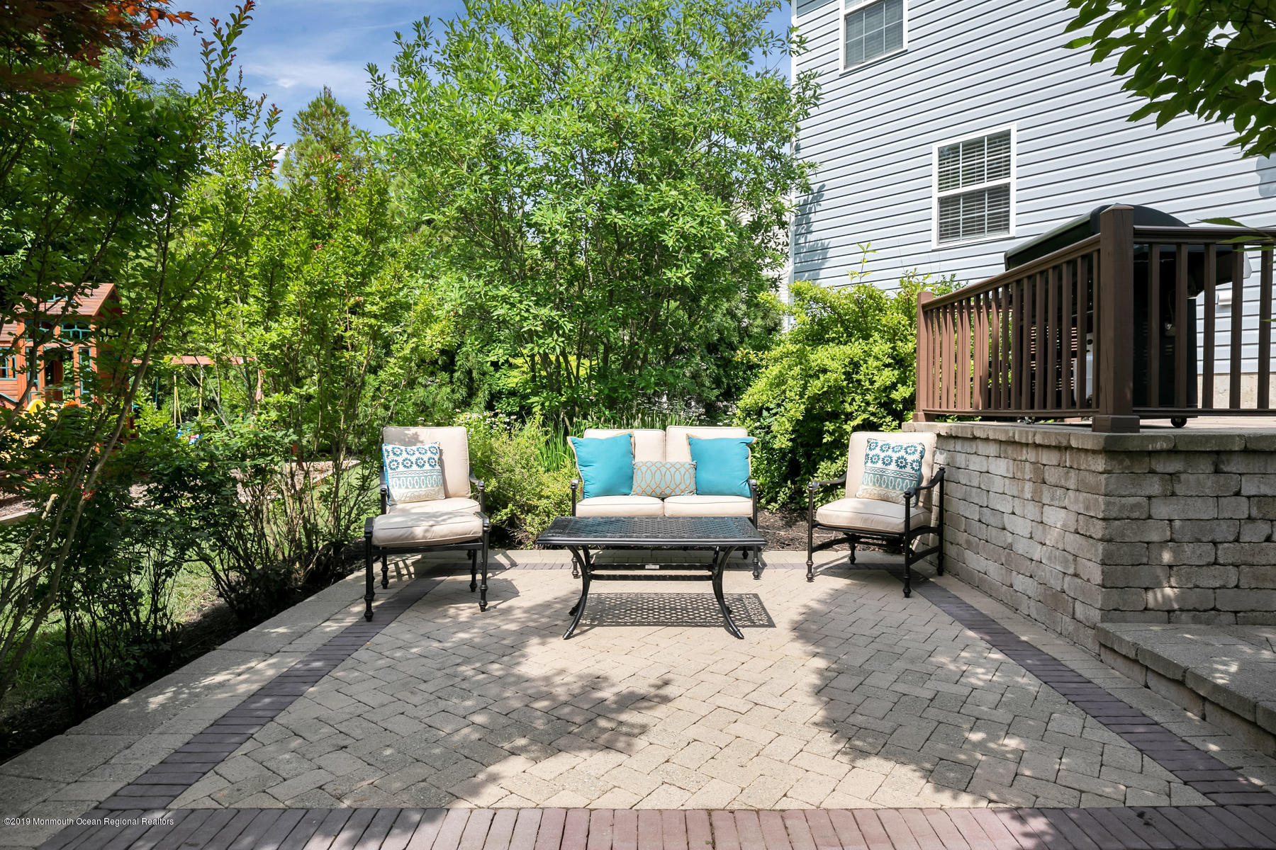 1614 Barkalow Road Wall, NJ 07719 - Photo 34 of 41 a bench sitting in front of a house