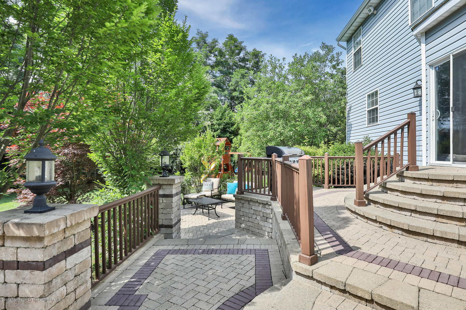 1614 Barkalow Road Wall, NJ 07719 - Photo 39 of 41 a view of a patio with chairs and potted plants
