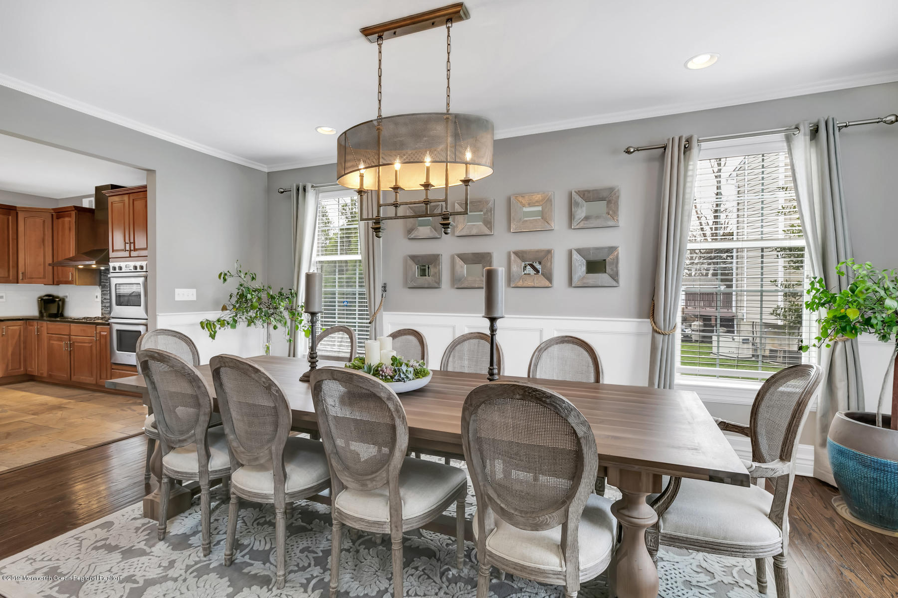 1614 Barkalow Road Wall, NJ 07719 - Photo 4 of 41 a dining room with furniture a chandelier and window