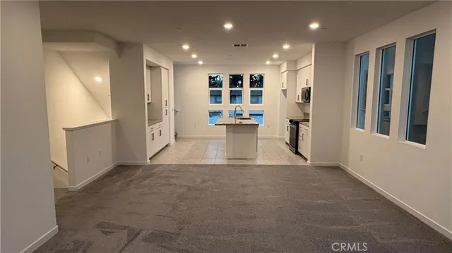 a view of livingroom with furniture and wooden floor
