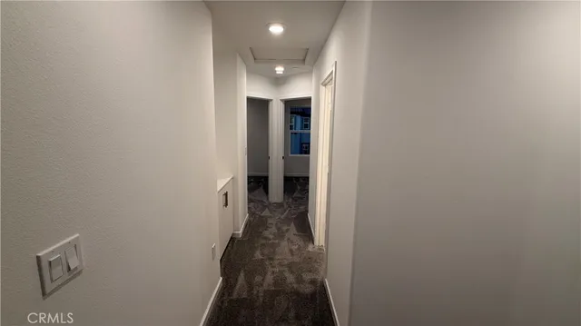 a view of hallway with stairs