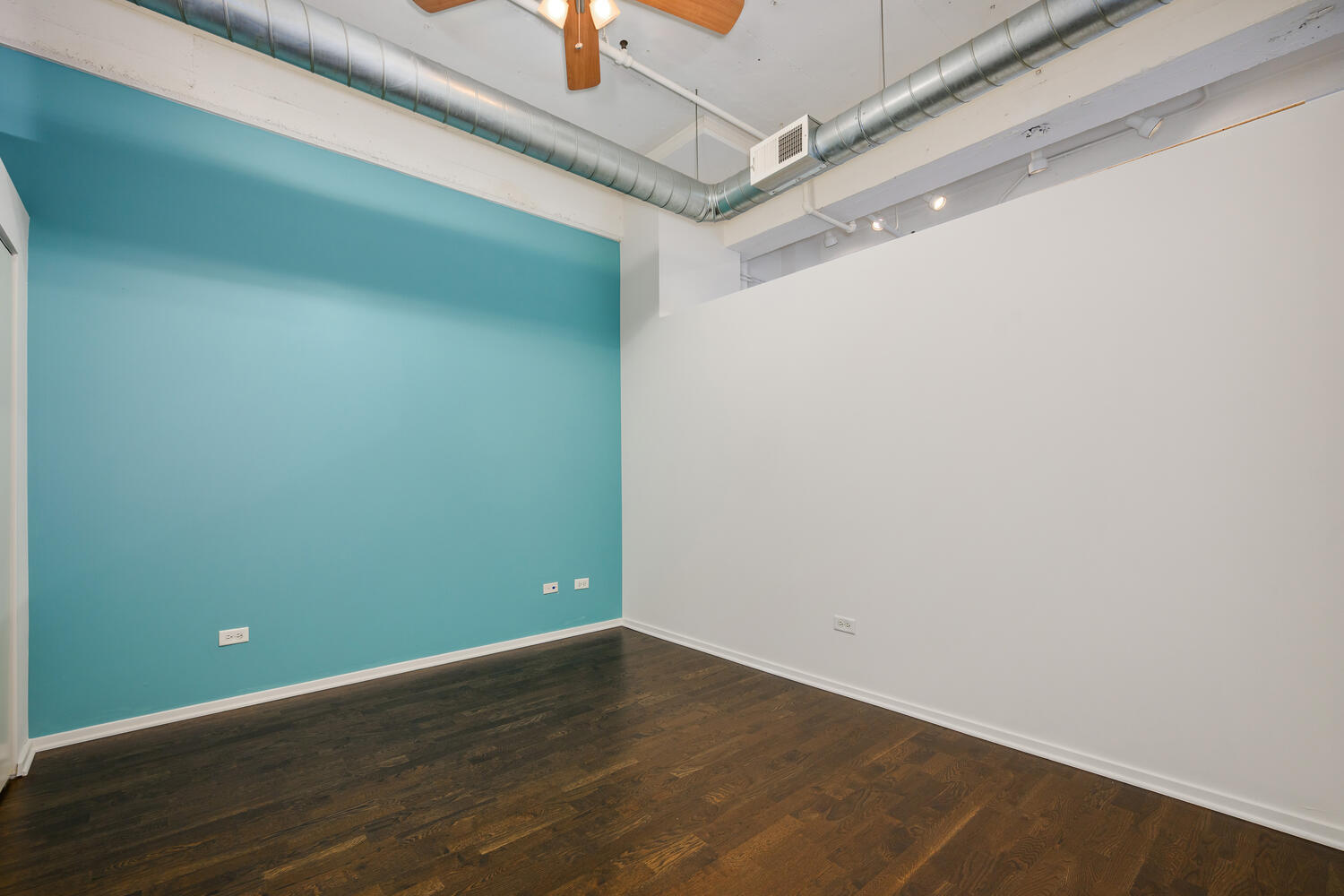 2323 West Pershing Road, Unit 222 Chicago, IL 60609 - Photo 13 of 22 a view of a room with wooden floor