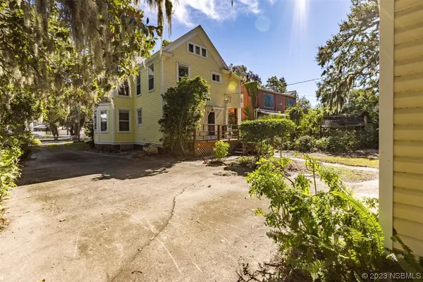 an aerial view of house with outdoor space