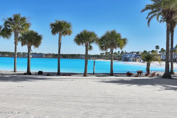 a view of houses with an outdoor space and lakeside