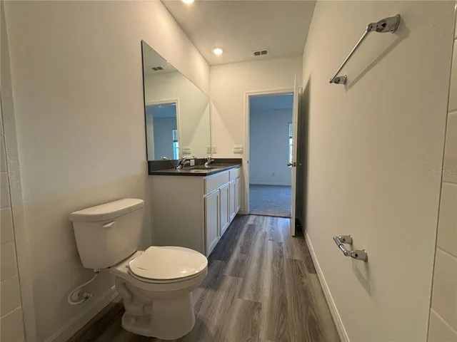 a view of a hallway with closet