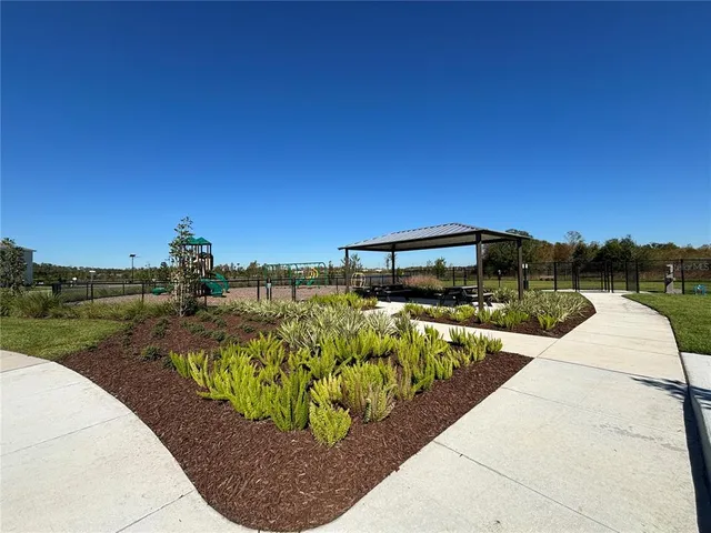 a view of a swimming pool with a lake view