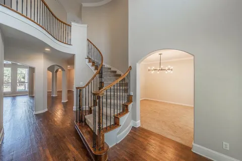 a view of entryway with wooden floor