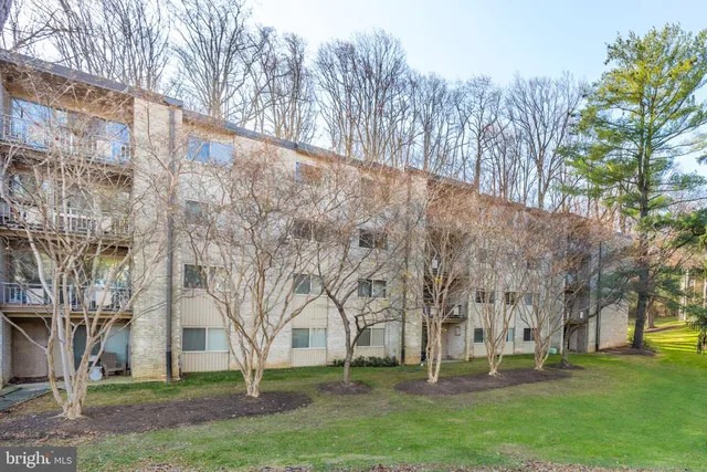 a view of building with trees