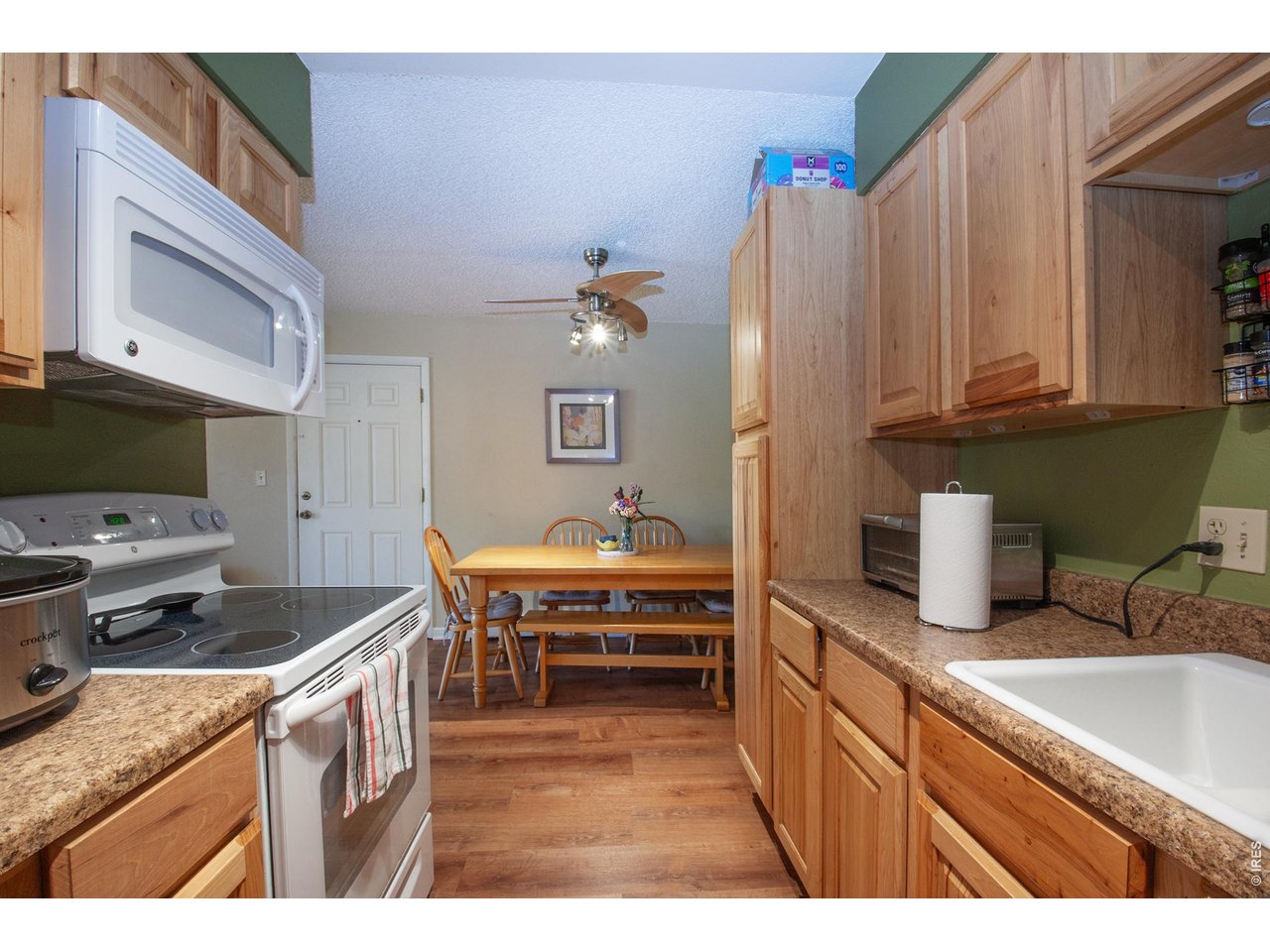 3400 Stanford Road, Unit 111 Fort Collins, CO 80525 - Photo 5 of 30 Kitchen view to Dining area