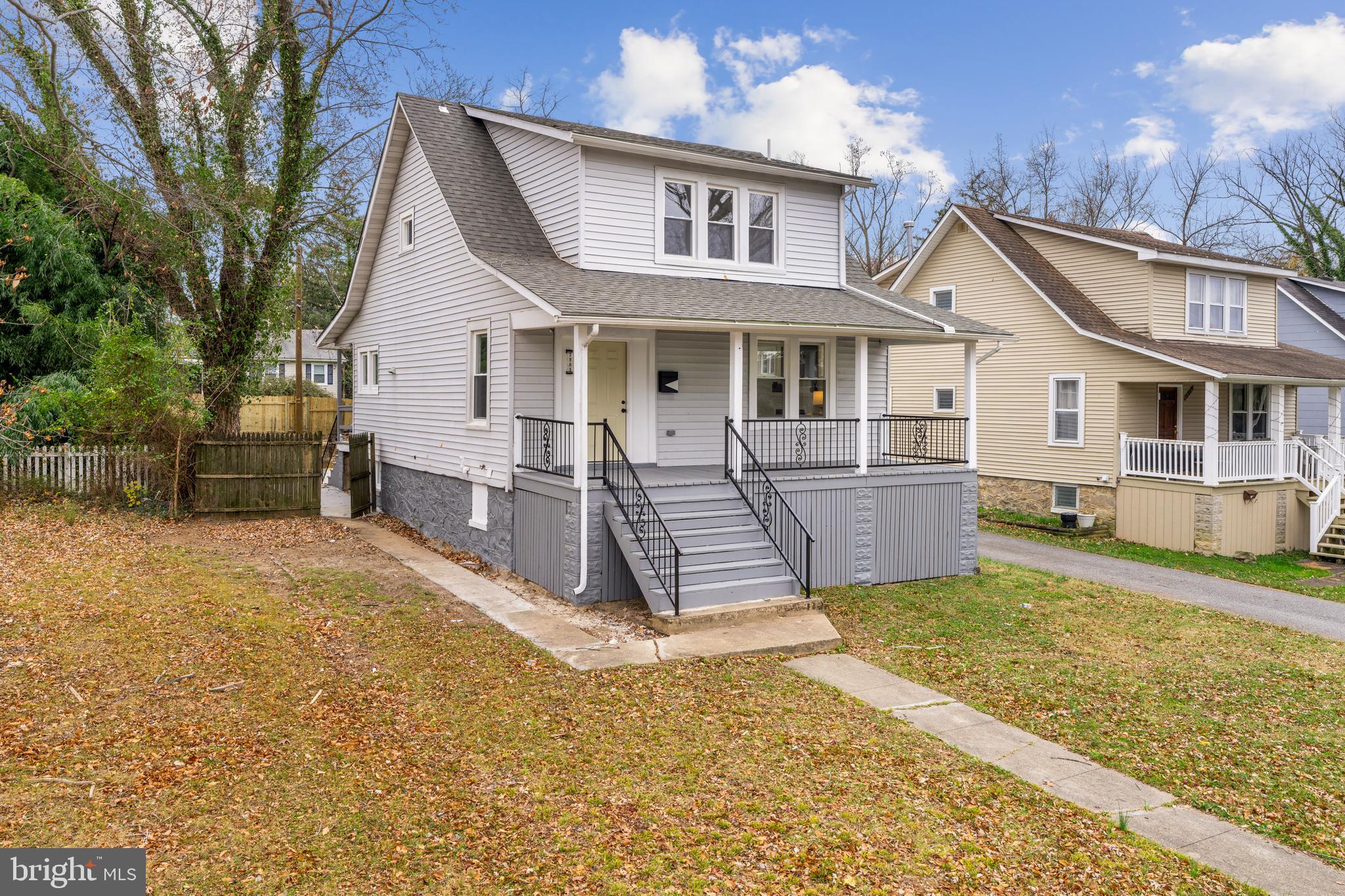 2905 Whitney Avenue Baltimore, MD 21215 - Photo 1 of 36 a front view of a house with a yard