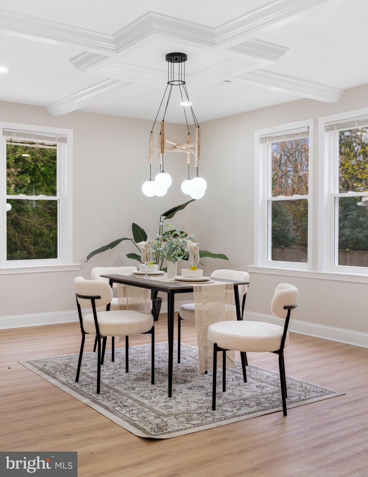 2905 Whitney Avenue Baltimore, MD 21215 - Photo 11 of 36 a view of a dining room with furniture window and wooden floor