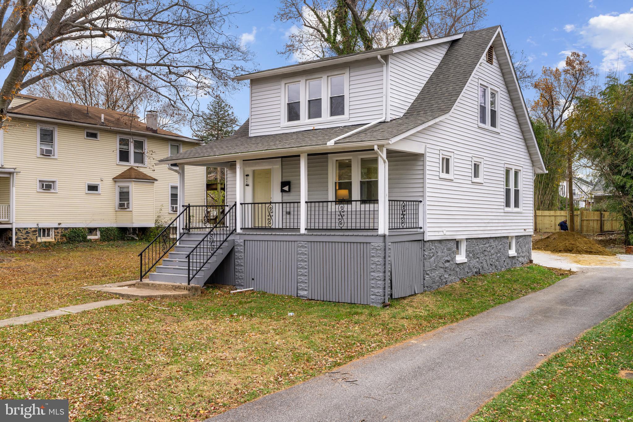 2905 Whitney Avenue Baltimore, MD 21215 - Photo 3 of 36 a view of a house with backyard and tree